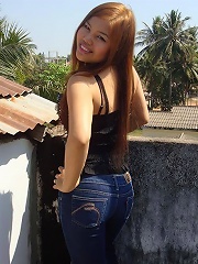 Lovely Asian amateur teen teasing us in front of her house